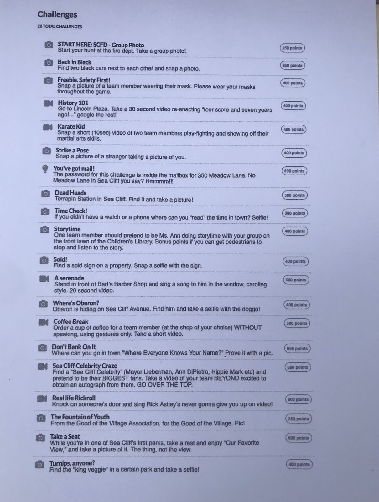 A printed list of scavenger hunt missions and point values